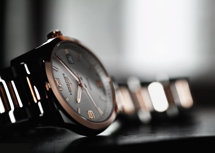 Longines Longines Conquest Collection L2.785.5.76.7, conquest швейцария мужские часы на браслете нержавеющая сталь + золото 18к боковой вид